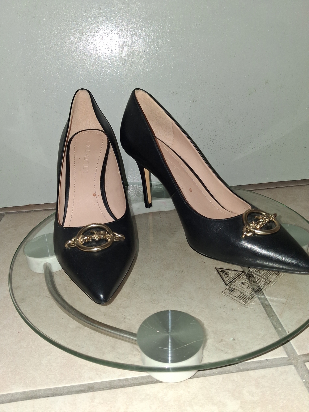 Coach Black Women's Pointed Toe Pumps with Gold Accent